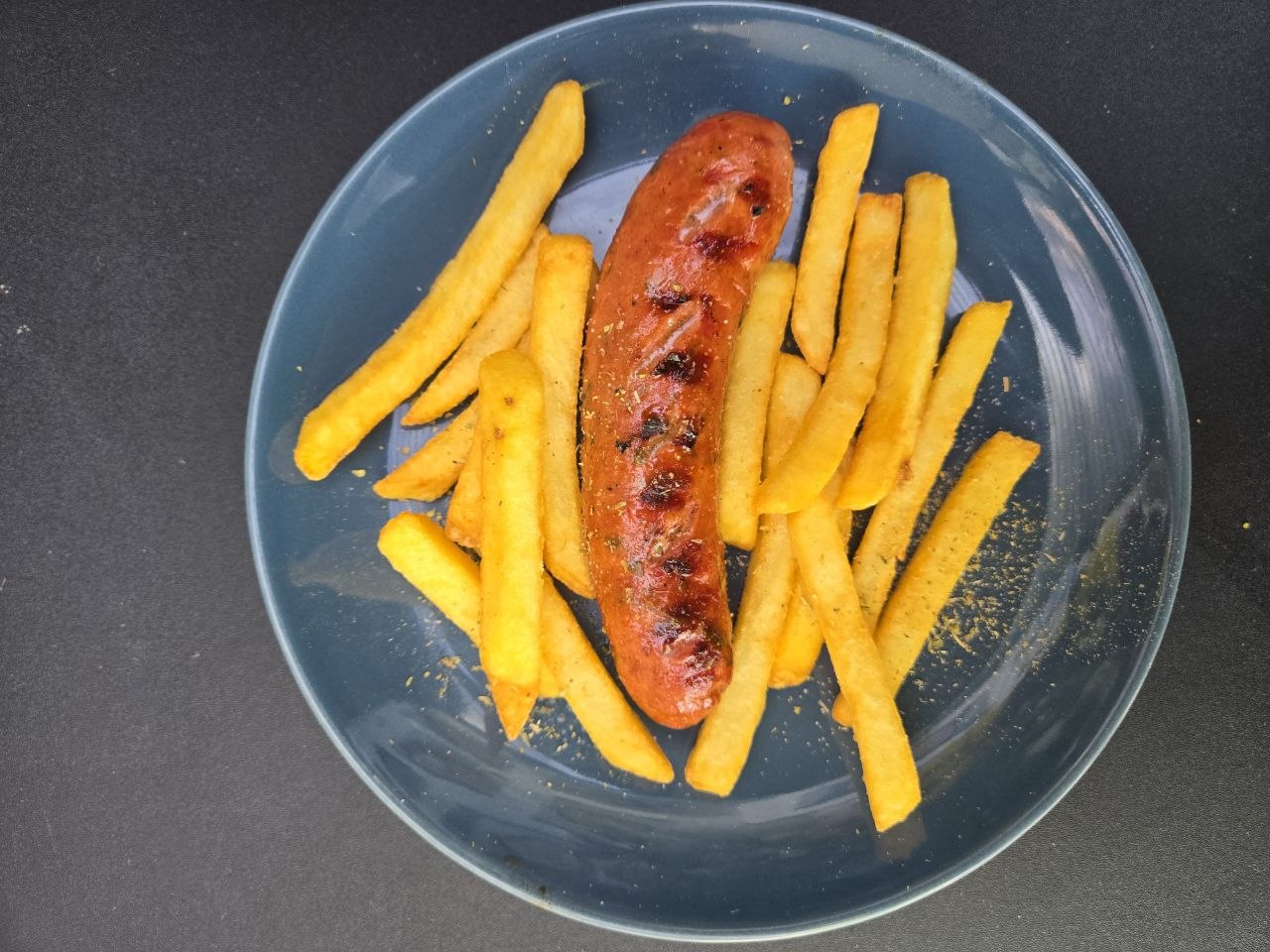 Single Greek sausage skewer served with french fries - Cristinas Greek Souvlaki Daventry